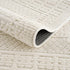 Alfombra lavable de color crema Bahar