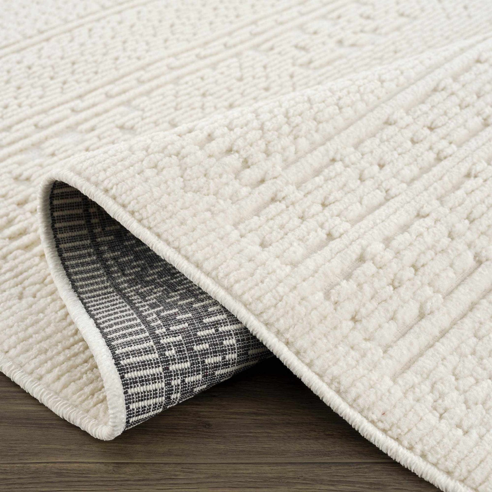 Alfombra lavable de color crema Bahar