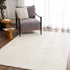 Alfombra lavable de color crema Bahar