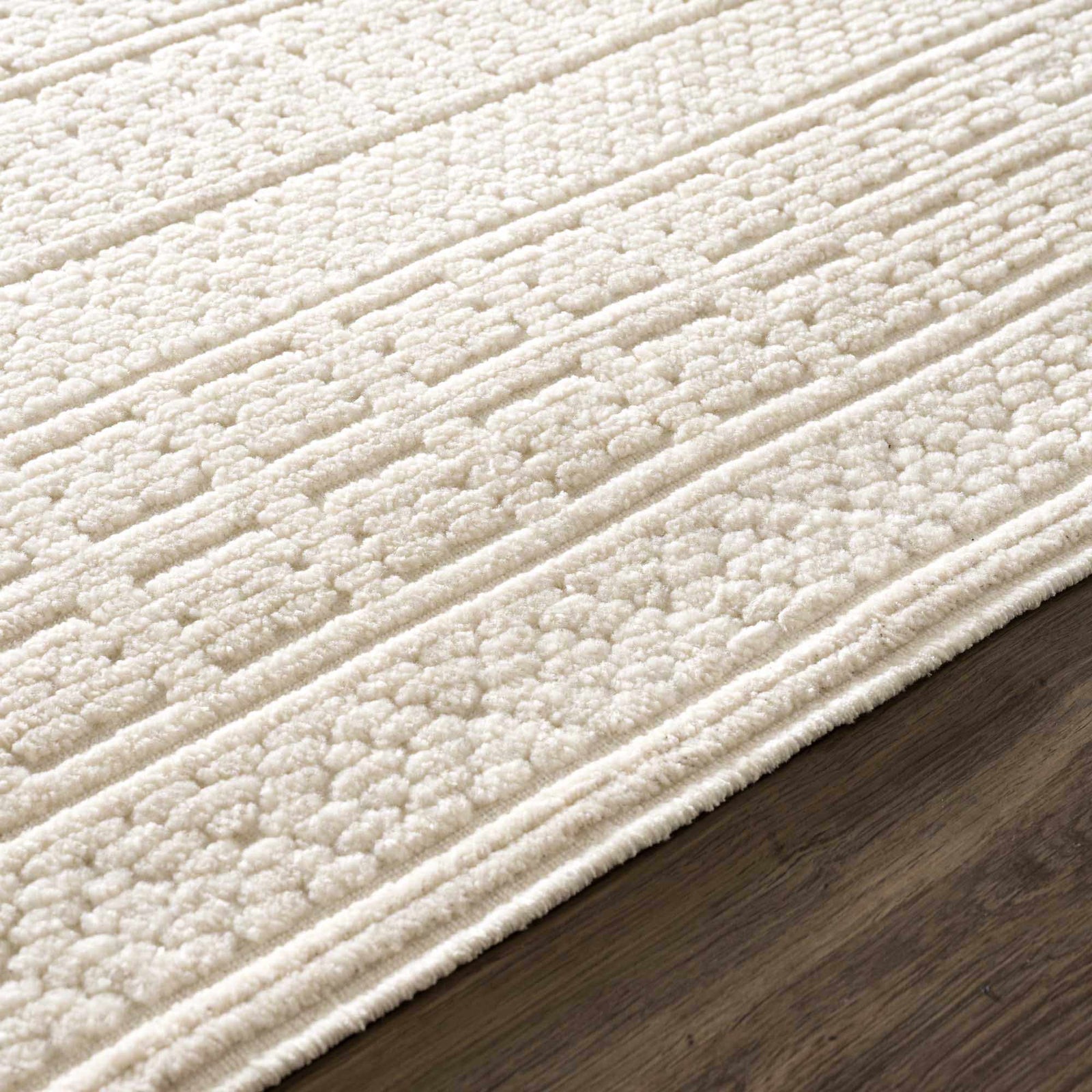 Alfombra lavable de color crema Bahar