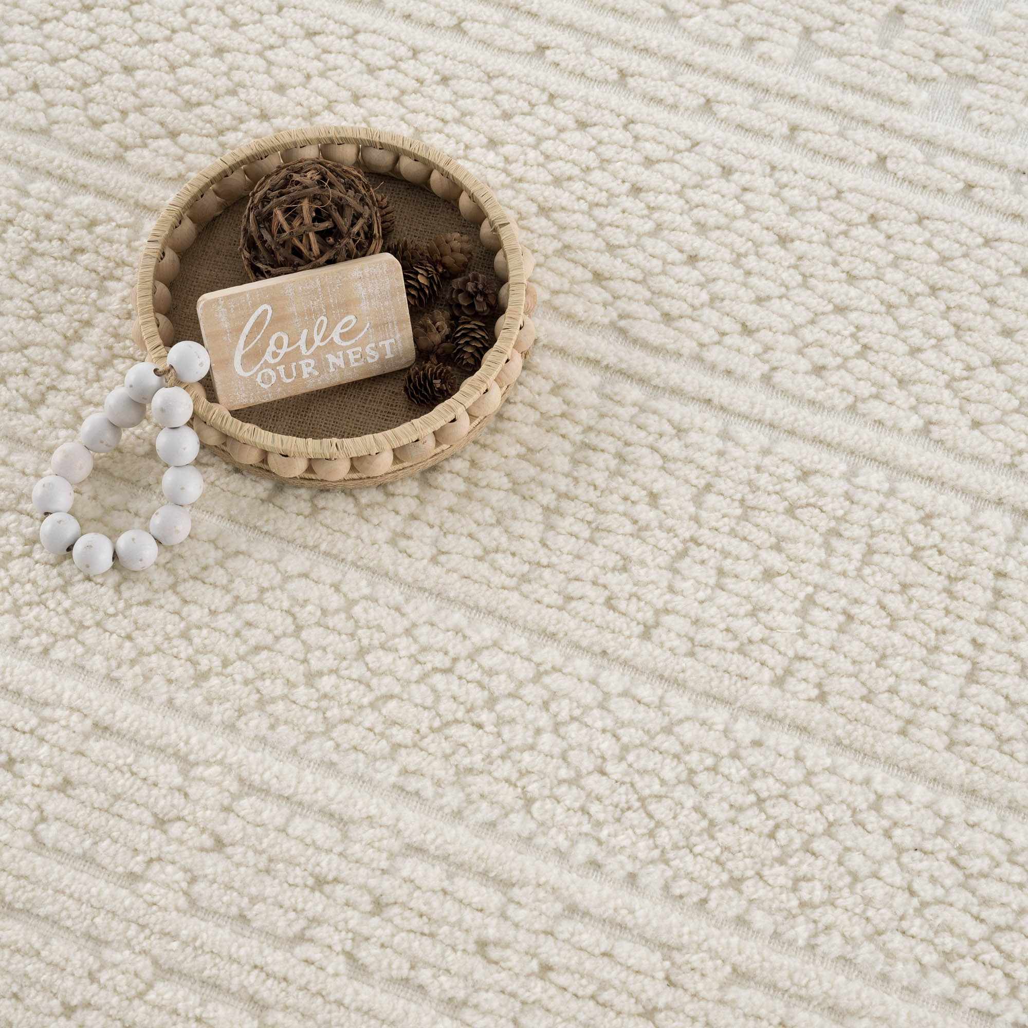 Alfombra lavable de color crema Bahar