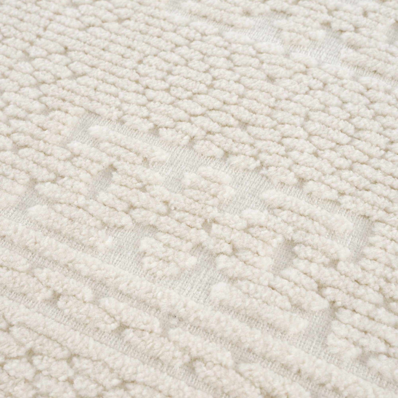 Alfombra lavable de color crema Bahar