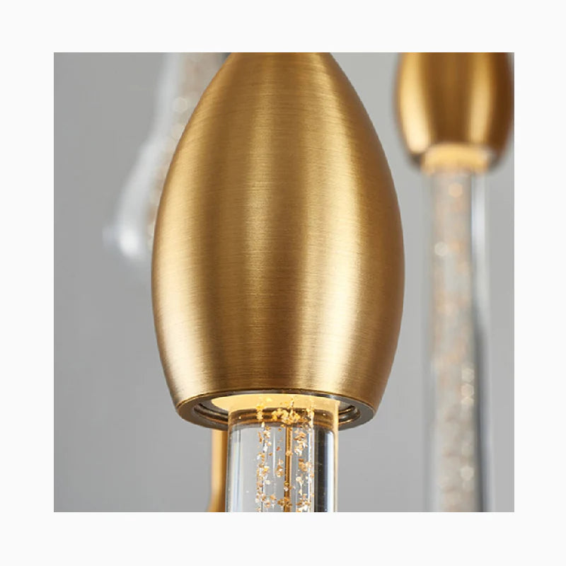 Castagniers | Lámpara de araña de cristal dorado con escalera