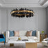 Lámpara de araña circular creativa moderna en negro y dorado para sala de estar