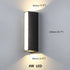 Lámpara de pared LED moderna de aluminio negro resistente al agua para exteriores, ideal para porche y jardín.