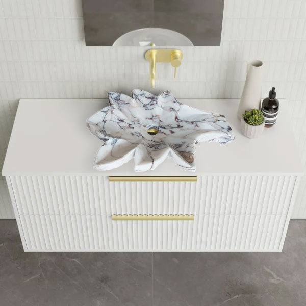 Lavabo de baño con diseño de hojas de mármol Calacatta Viola pulido sobre tocador