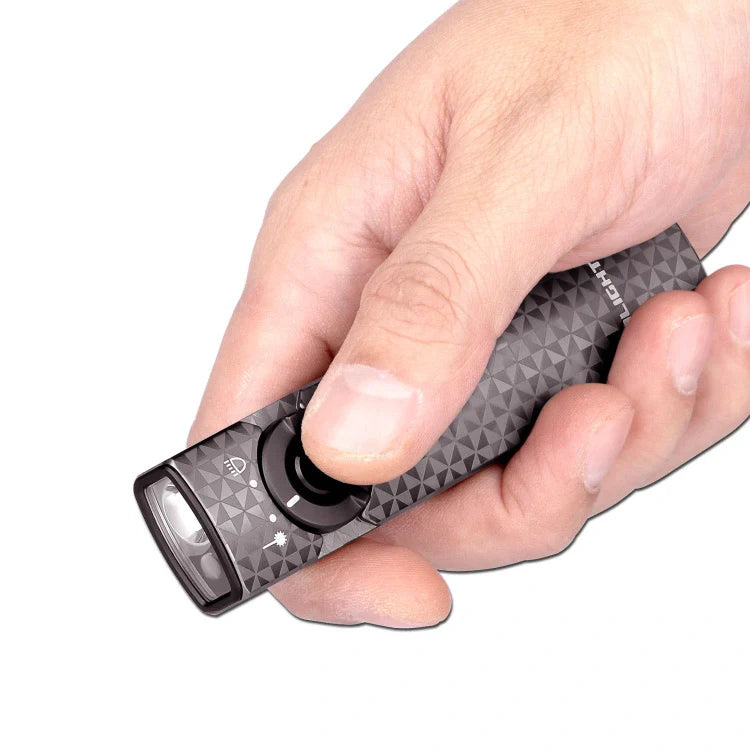 OLIGHT ARKFELDPWGMGCW Linterna plana Arkfeld con láser verde y luz blanca - Gris metalizado con forma de rueda dentada