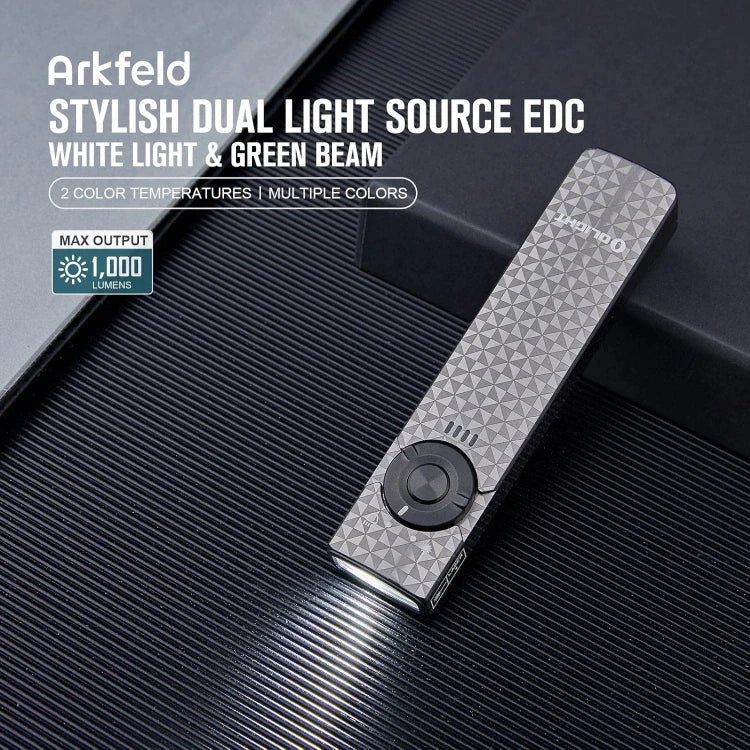 OLIGHT ARKFELDPWGMGCW Linterna plana Arkfeld con láser verde y luz blanca - Gris metalizado con forma de rueda dentada