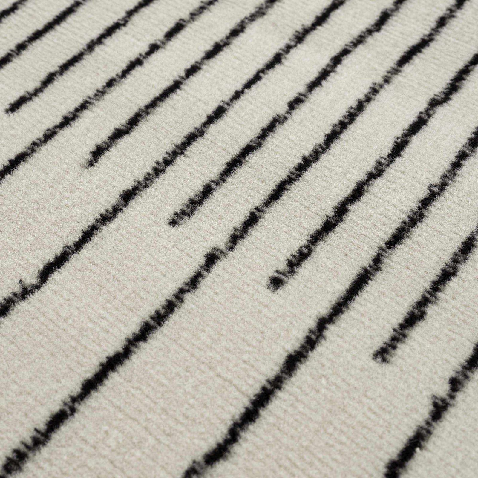 Alfombra con diseño geométrico en blanco y negro Angus