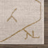 Alfombra Azzan color crema y dorado - Liquidación