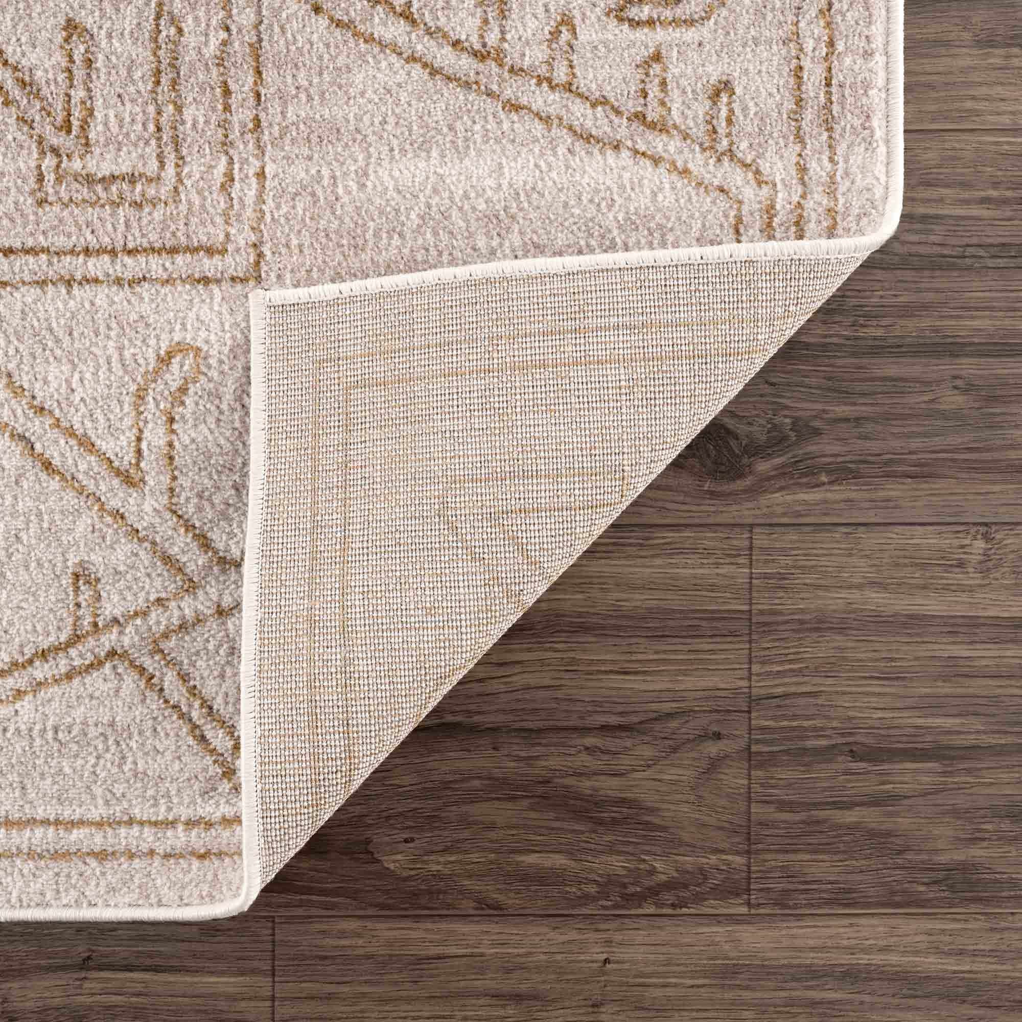 Alfombra Divya color crema y dorado - Liquidación