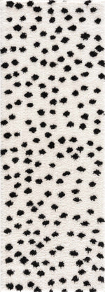Alfombra de lunares blancos y negros de Cansu