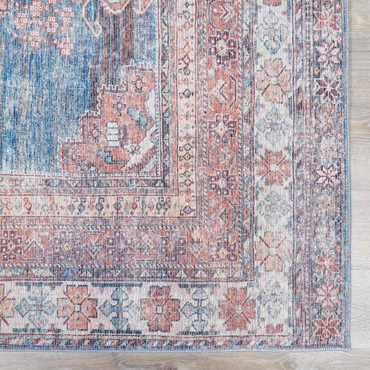 Alfombra lavable Baltinglass color óxido y azul - Liquidación