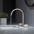 Grifo para lavabo de baño de níquel cepillado con cascada, dos manijas y desagüe emergente de latón.