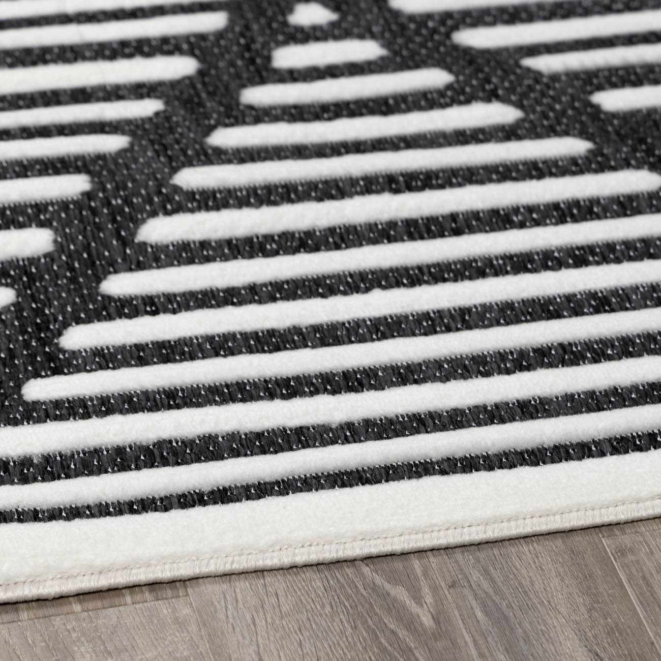 Alfombra duradera negra Anah