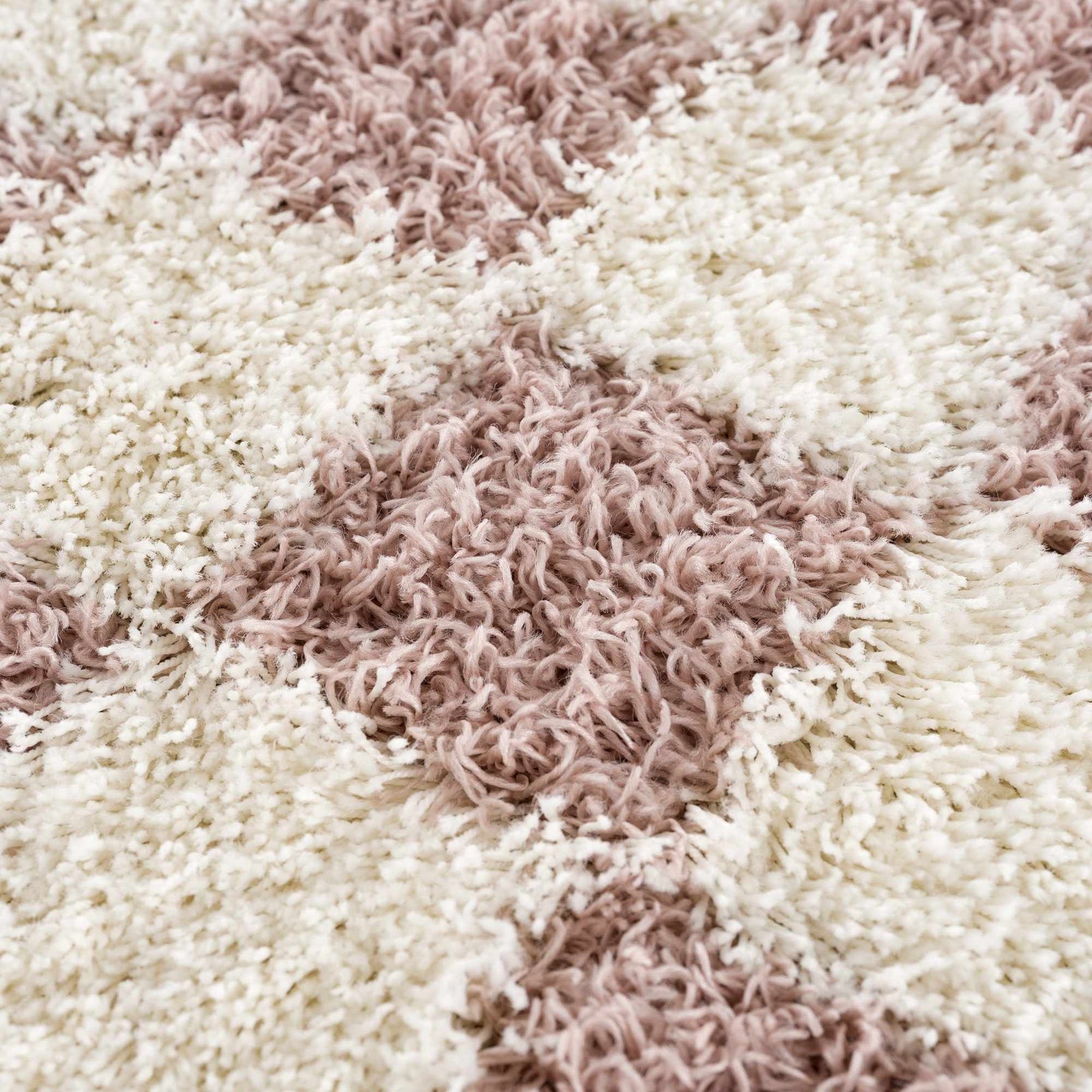 Alfombra peluda de cuadros rosas Atira