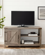 Mueble de TV con puerta de granero