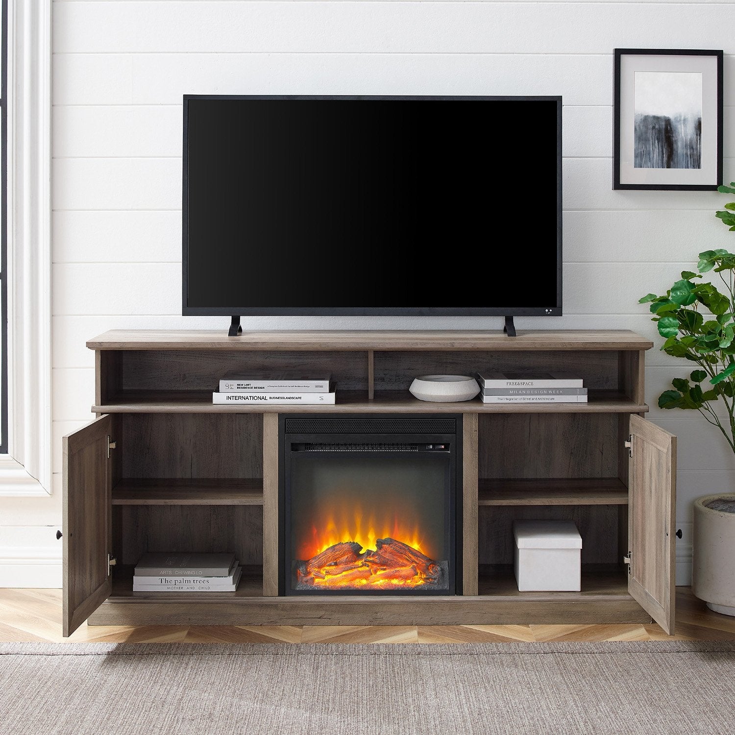 Mueble de TV con chimenea y puerta de granero Cherrington