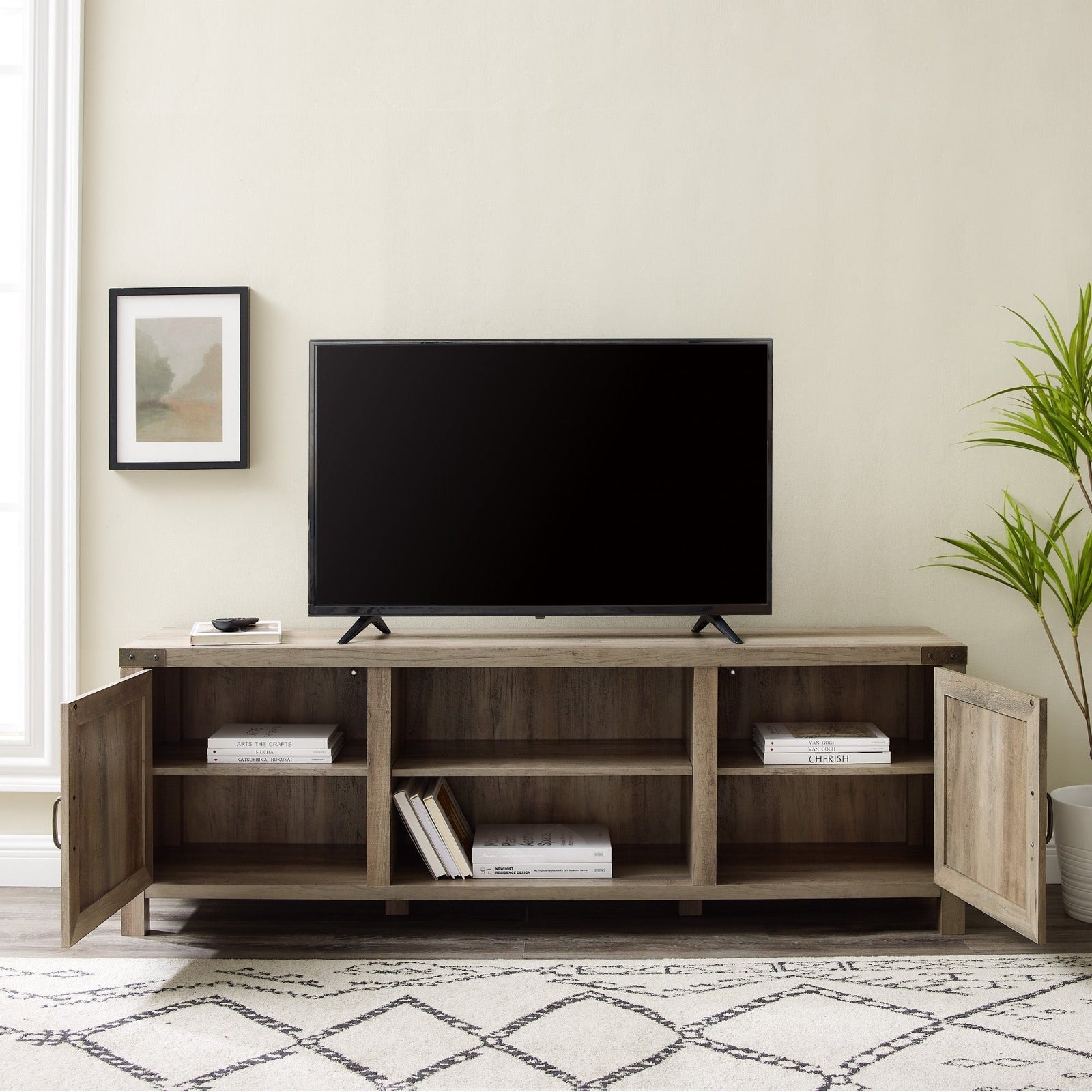 Mueble de TV con puerta de granero