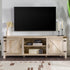 Mueble de TV con puerta de granero