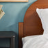 Cama Elias de madera maciza con cabecero arqueado