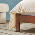 Cama Elias de madera maciza con cabecero arqueado