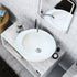 Lavabo de baño con borde inclinado de piedra natural caliza blanca sobre tocador