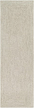 Alfombra trenzada de yute sintético de color beige