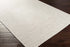 Alfombra trenzada de yute sintético de color beige
