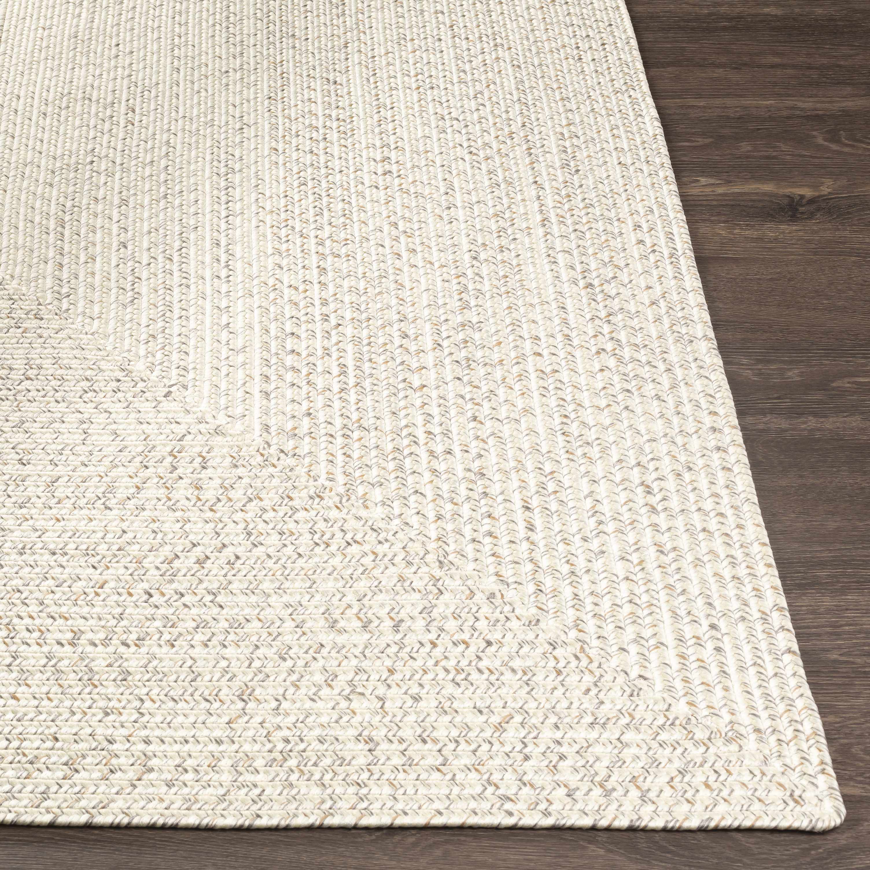 Alfombra trenzada de yute sintético de color beige
