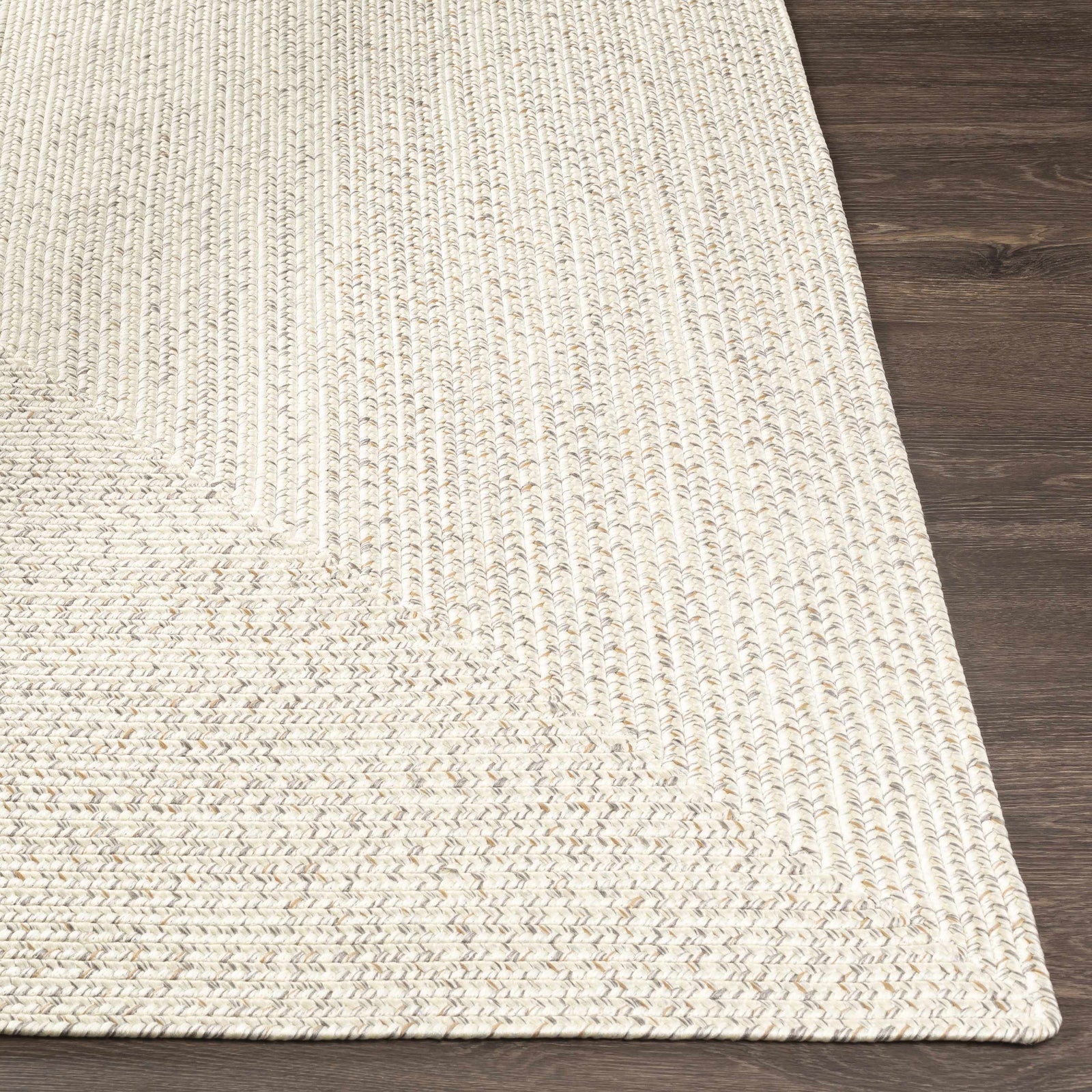 Alfombra trenzada de yute sintético de color beige