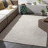 Alfombra trenzada de yute sintético de color beige