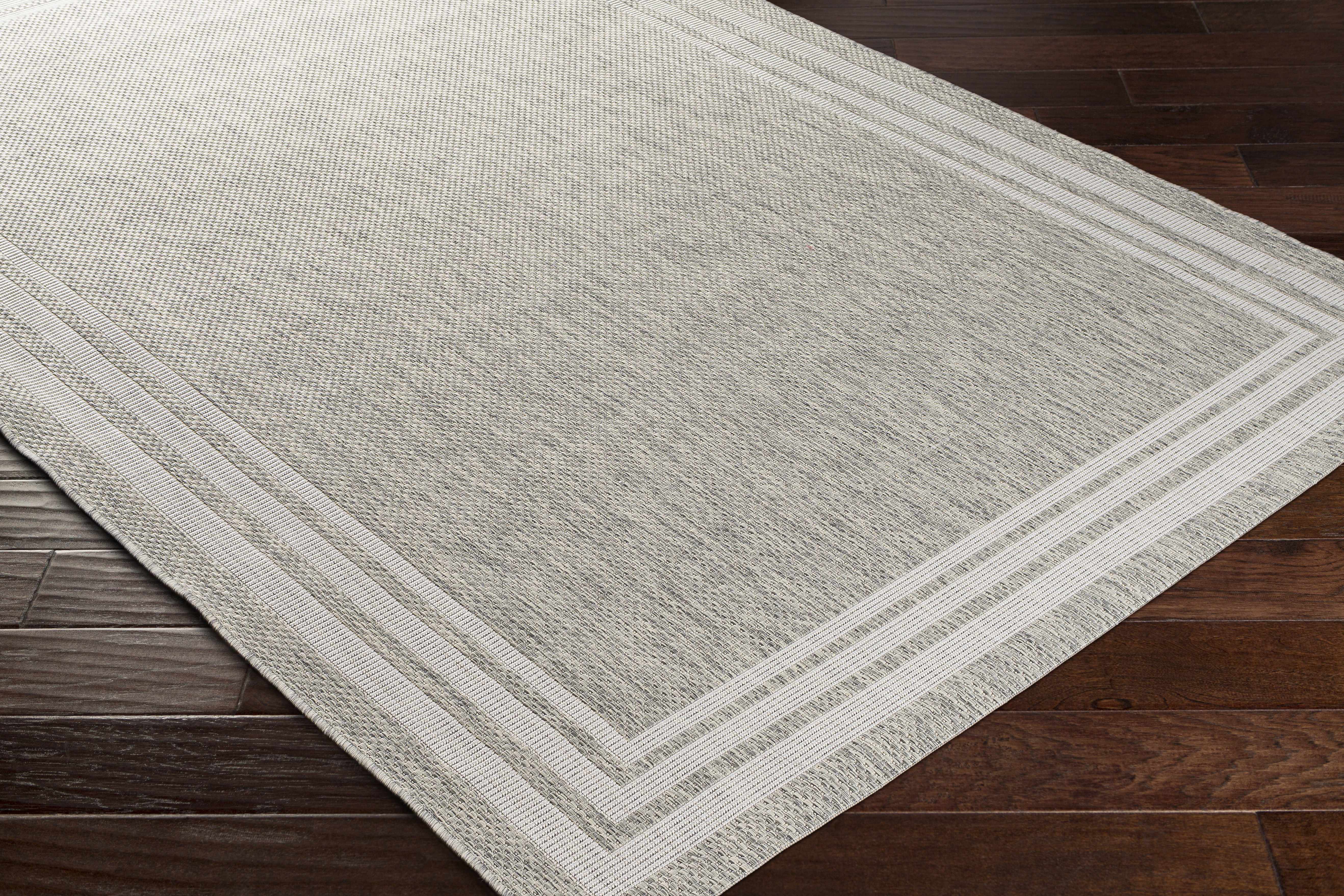 Alfombra beige con borde Burradoo