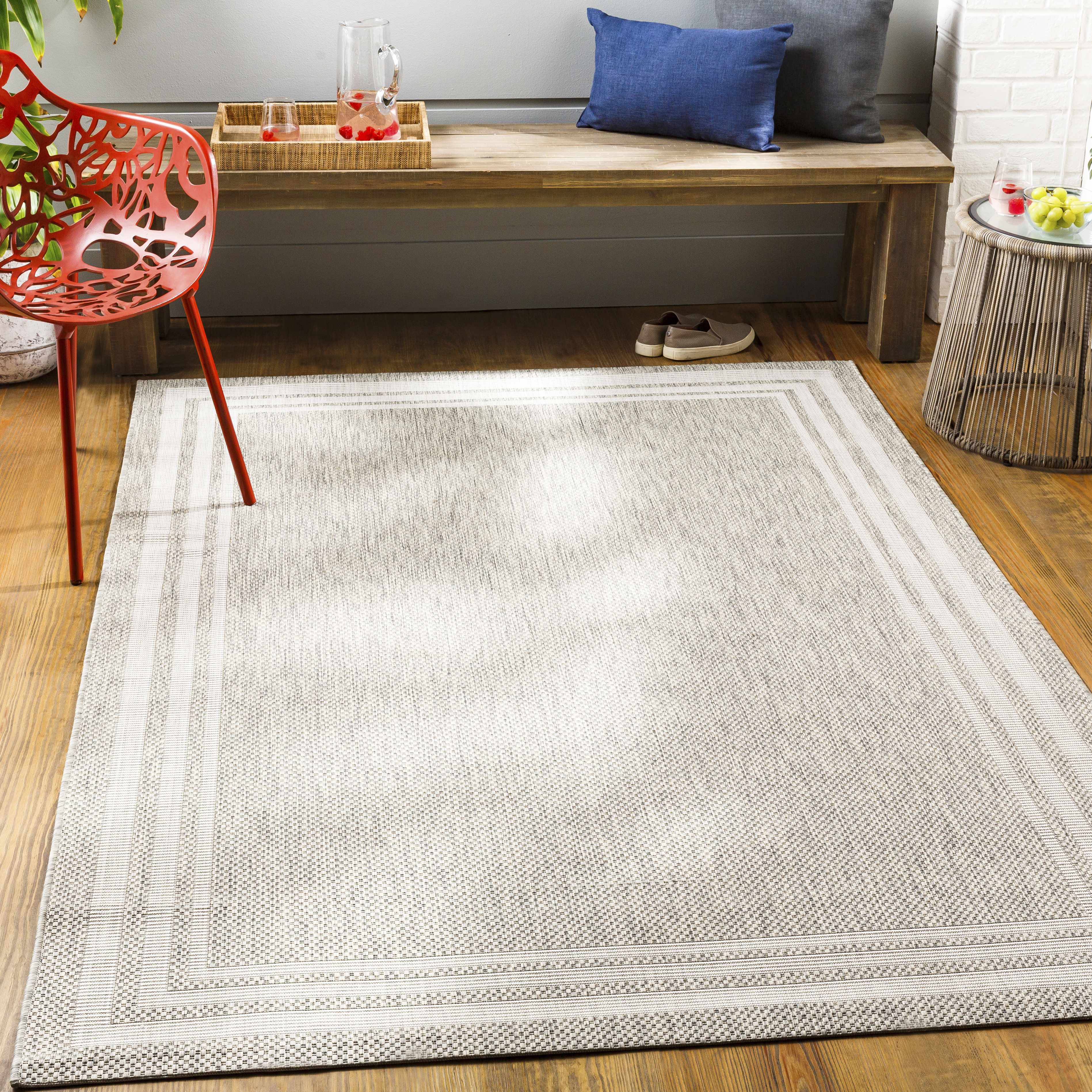 Alfombra beige con borde Burradoo