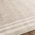 Alfombra beige con borde Burradoo