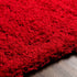 Alfombra peluda de color rojo liso Siari