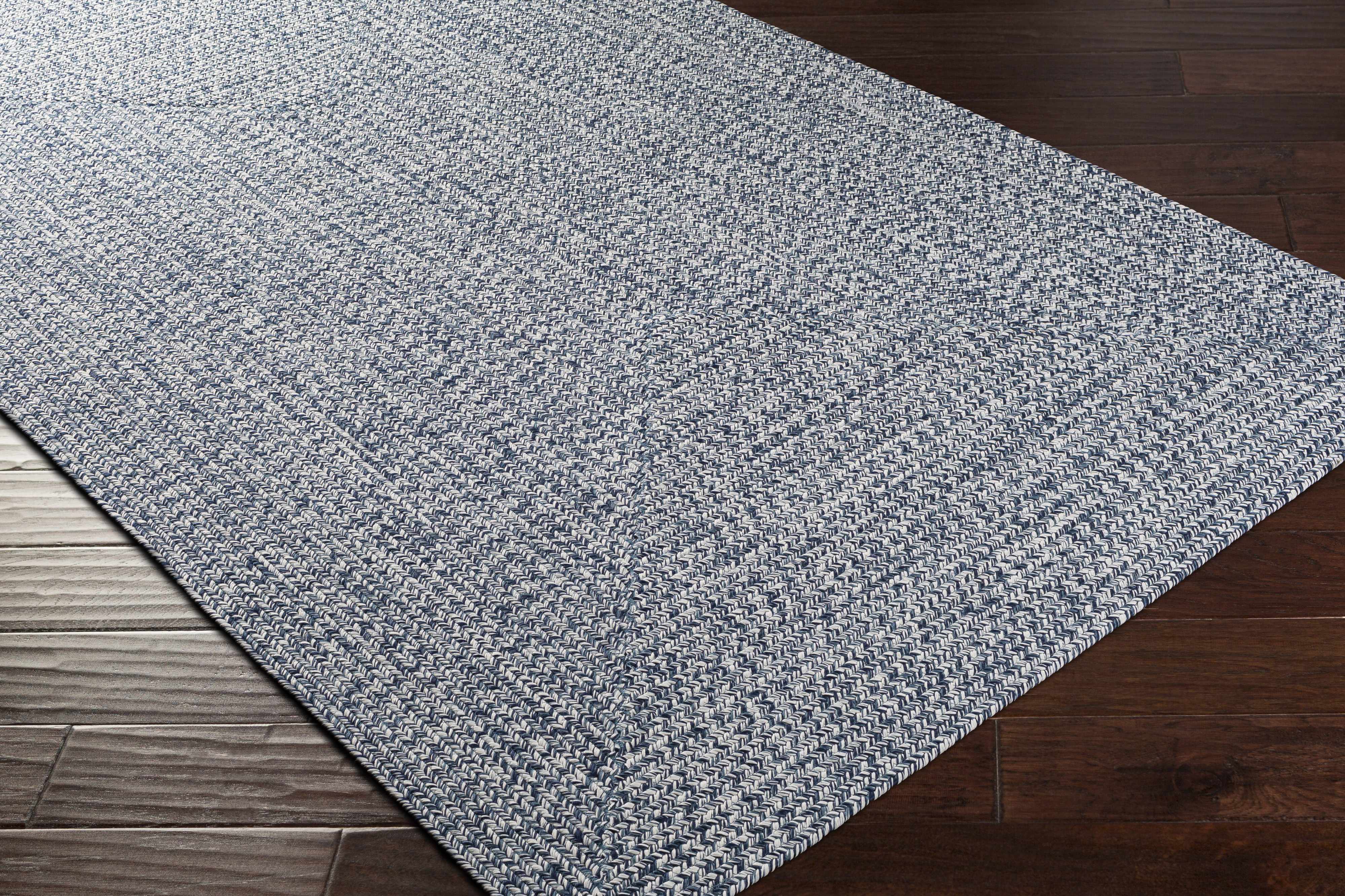 Alfombra trenzada de yute sintético de color azul
