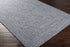 Alfombra trenzada de yute sintético de color azul