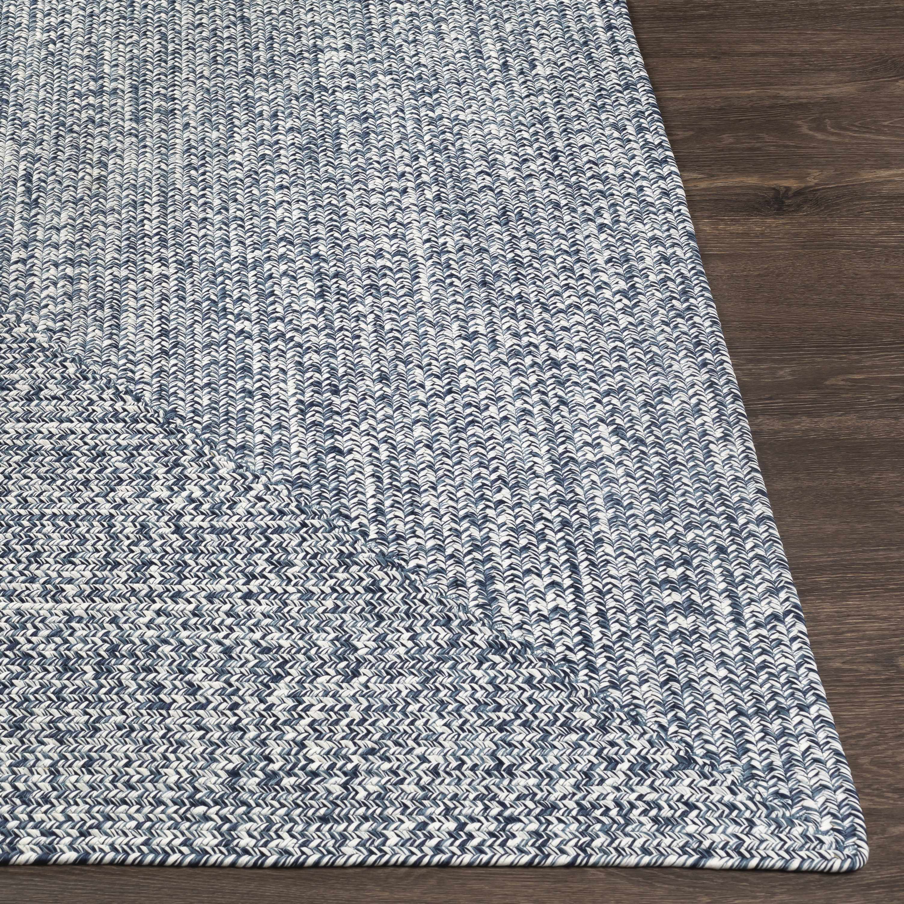 Alfombra trenzada de yute sintético de color azul