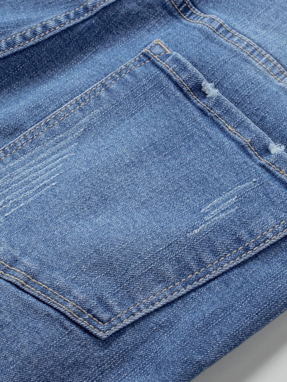 Trendy Ripped Denim Shorts with Unique Floral Design