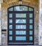 Puerta de hierro contemporánea Atlas con ventanas laterales