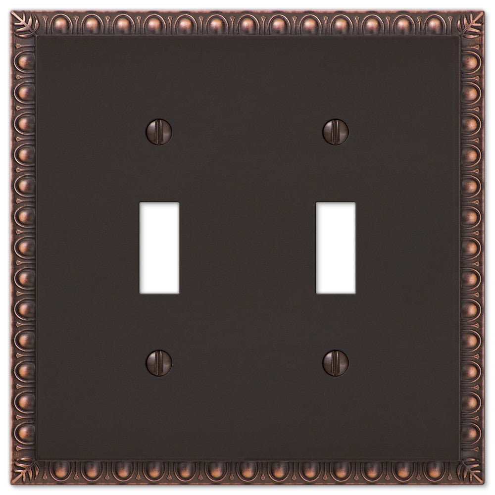 Placa de pared con 2 palancas de bronce envejecido con forma de huevo y dardo