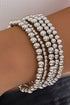 Elegant White Beaded Bracelet with Multi-Layered Design