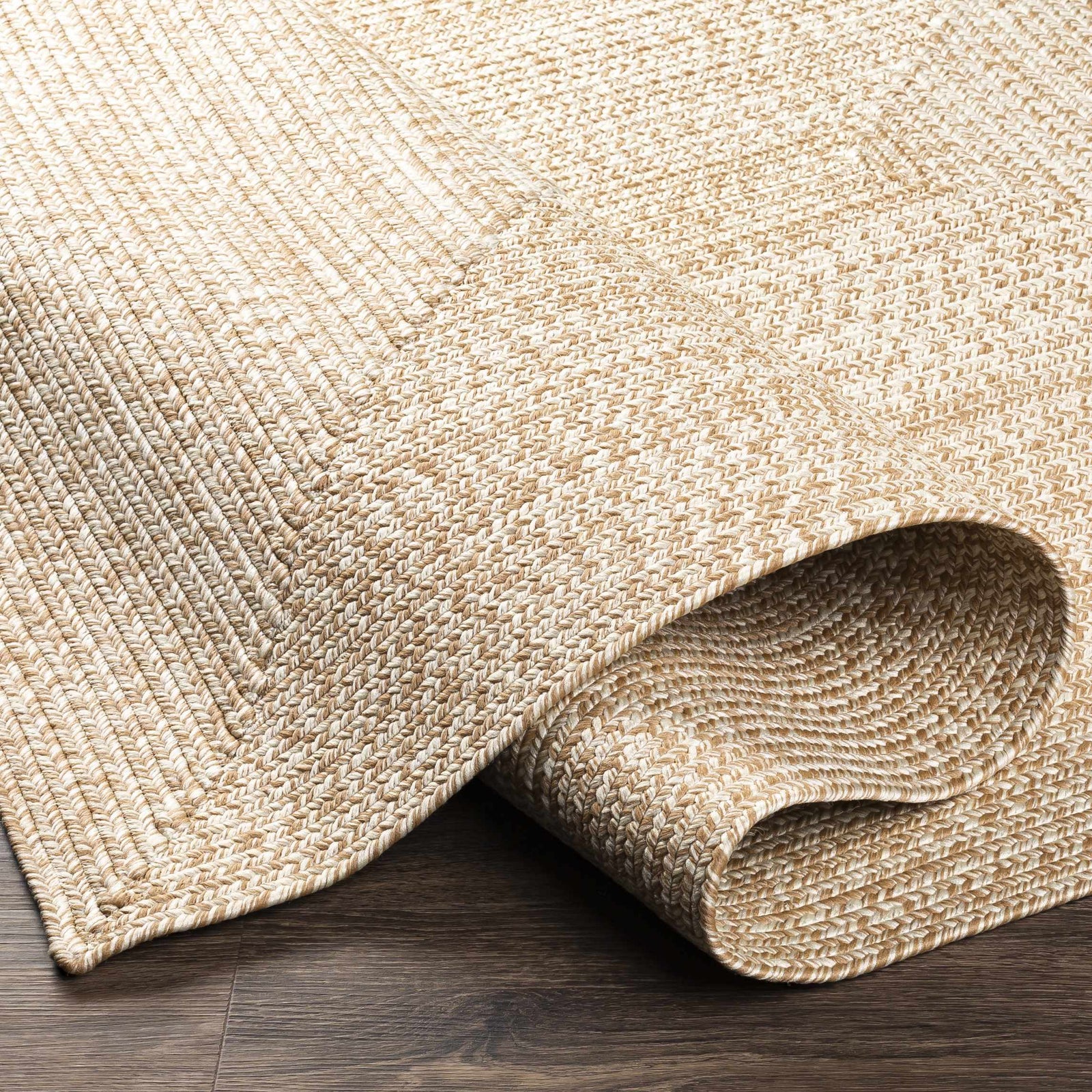 Alfombra trenzada de yute sintético de color crema