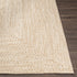 Alfombra trenzada de yute sintético de color crema