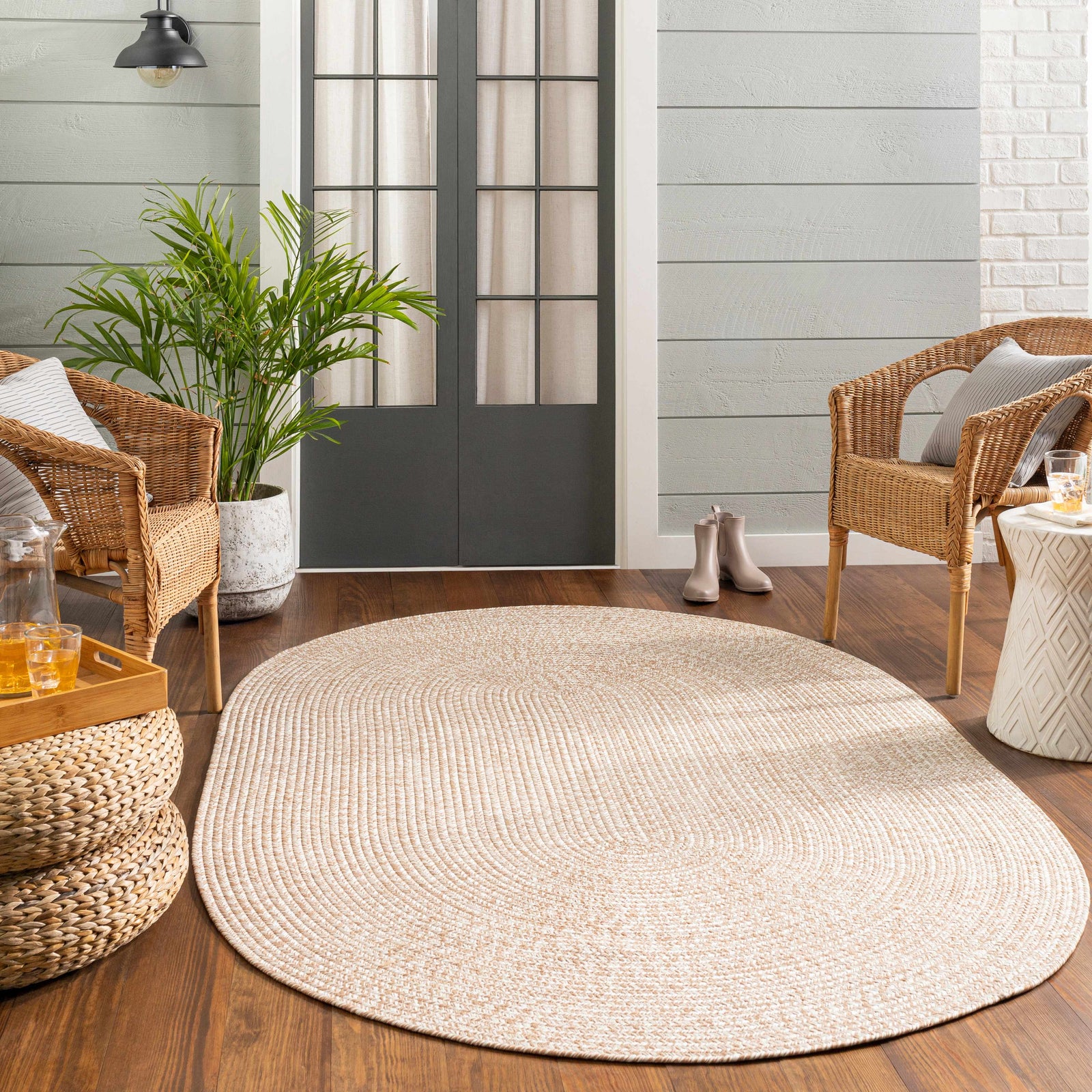 Alfombra trenzada de yute sintético de color crema