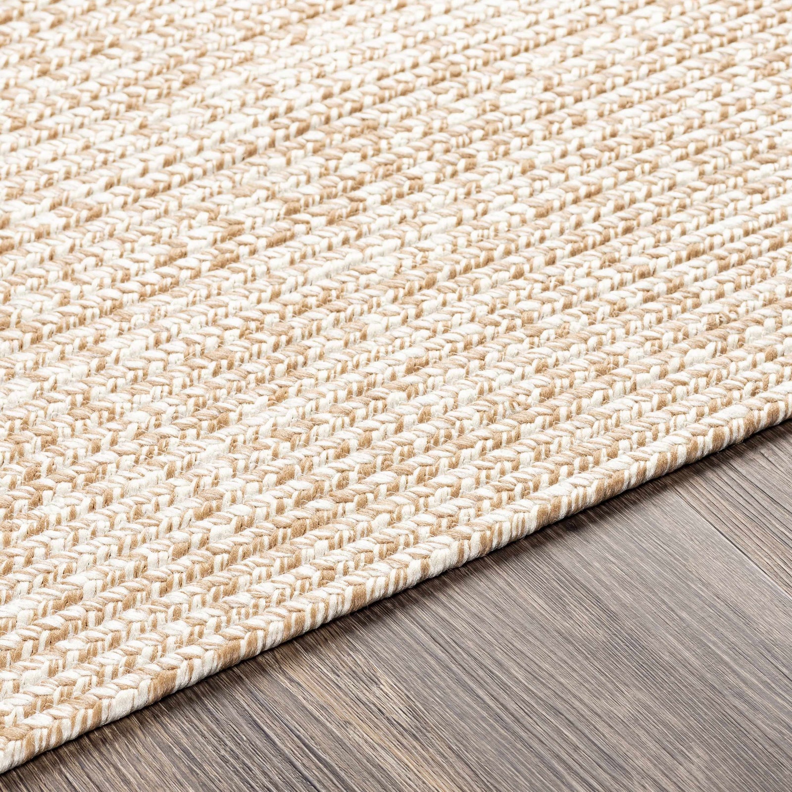 Alfombra trenzada de yute sintético de color crema