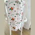 Conjunto de regalo: manta de muselina para envolver al bebé y paño eructador/babero combinados de Carolina del Norte (floral)