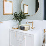 Lavabo de baño de piedra natural de ónix translúcido verde sobre encimera