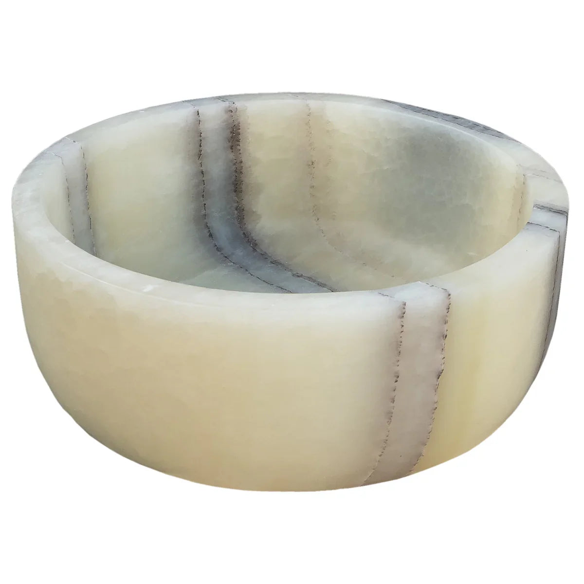 Lavabo de baño de piedra natural de ónix translúcido verde sobre encimera